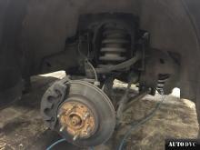 Installing a set of spacers to increase the ground clearance Chevrolet Tahoe Lift Kits (leveling kits and coil spring spacer\strut spacer)