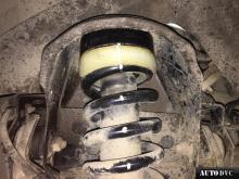 Installing a set of spacers to increase the ground clearance Chevrolet Trailblazer Lift Kits (leveling kits and coil spring spacer\strut spacer)