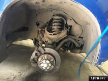 Installing a set of spacers to increase the ground clearance Chevrolet Trailblazer Lift Kits (leveling kits and coil spring spacer\strut spacer)