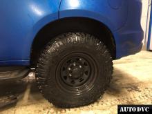 Installing a set of spacers to increase the ground clearance Chevrolet TrailBlazer II Lift Kits (leveling kits and coil spring spacer\strut spacer)