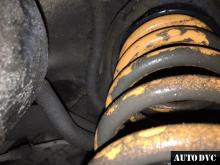 Installing a set of spacers to increase the ground clearance Chevrolet TrailBlazer II Lift Kits (leveling kits and coil spring spacer\strut spacer)
