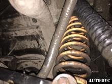 Installing a set of spacers to increase the ground clearance Chevrolet TrailBlazer II Lift Kits (leveling kits and coil spring spacer\strut spacer)