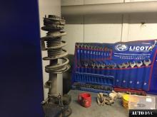 Installing a set of spacers to increase the ground clearance Dodge Grand Caravan V Lift Kits (leveling kits and coil spring spacer\strut spacer)