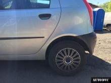 Installing a set of spacers to increase the ground clearance Fiat Punto Lift Kits (leveling kits and coil spring spacer\strut spacer)