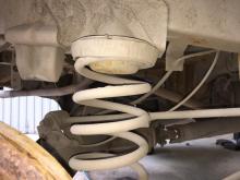 Installing a set of spacers to increase the ground clearance Toyota LiteAce Lift Kits (leveling kits and coil spring spacer\strut spacer)