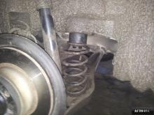 Installing a set of spacers to increase the ground clearance Volkswagen Scirocco Lift Kits (leveling kits and coil spring spacer\strut spacer)