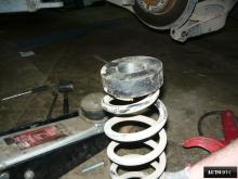 Installing a set of spacers to increase the ground clearance Volkswagen Touran Lift Kits (leveling kits and coil spring spacer\strut spacer)