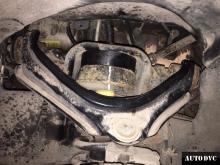 Installing a set of spacers to increase the ground clearance Ford Explorer Lift Kits (leveling kits and coil spring spacer\strut spacer)