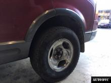 Installing a set of spacers to increase the ground clearance Ford Explorer Lift Kits (leveling kits and coil spring spacer\strut spacer)