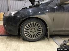 Installing a set of spacers to increase the ground clearance Ford Focus Lift Kits (leveling kits and coil spring spacer\strut spacer)