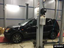 Installing a set of spacers to increase the ground clearance Ford Fusion Lift Kits (leveling kits and coil spring spacer\strut spacer)