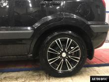 Installing a set of spacers to increase the ground clearance Ford Fusion Lift Kits (leveling kits and coil spring spacer\strut spacer)