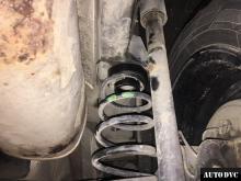 Installing a set of spacers to increase the ground clearance Ford Fusion Lift Kits (leveling kits and coil spring spacer\strut spacer)
