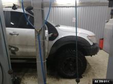 Installing a set of spacers to increase the ground clearance Ford Ranger III  Lift Kits (leveling kits and coil spring spacer\strut spacer)