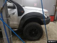 Installing a set of spacers to increase the ground clearance Ford Ranger III  Lift Kits (leveling kits and coil spring spacer\strut spacer)