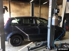 Installing a set of spacers to increase the ground clearance Ford C-Max Lift Kits (leveling kits and coil spring spacer\strut spacer)