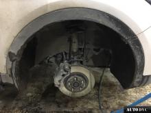 Installing a set of spacers to increase the ground clearance Hyundai Santa Fe III Lift Kits (leveling kits and coil spring spacer\strut spacer)