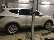 Installing a set of spacers to increase the ground clearance Hyundai Santa Fe III Lift Kits (leveling kits and coil spring spacer\strut spacer)