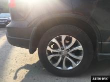 Installing a set of spacers to increase the ground clearance Honda CR-V Lift Kits (leveling kits and coil spring spacer\strut spacer)