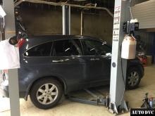 Installing a set of spacers to increase the ground clearance Honda CR-V Lift Kits (leveling kits and coil spring spacer\strut spacer)