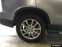 Installing a set of spacers to increase the ground clearance Honda CR-V Lift Kits (leveling kits and coil spring spacer\strut spacer)