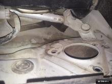 Installing a set of spacers to increase the ground clearance Honda Pilot II Lift Kits (leveling kits and coil spring spacer\strut spacer)