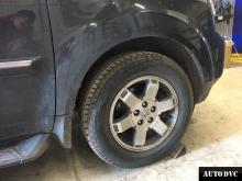 Installing a set of spacers to increase the ground clearance Honda Pilot Lift Kits (leveling kits and coil spring spacer\strut spacer)
