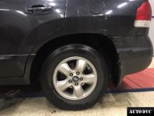 Installing a set of spacers to increase the ground clearance Hyundai Santa Fe Lift Kits (leveling kits and coil spring spacer\strut spacer)