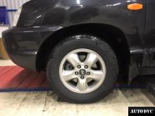Installing a set of spacers to increase the ground clearance Hyundai Santa Fe Lift Kits (leveling kits and coil spring spacer\strut spacer)