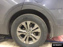 Installing a set of spacers to increase the ground clearance Hyundai Santa Fe III Lift Kits (leveling kits and coil spring spacer\strut spacer)