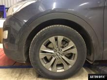 Installing a set of spacers to increase the ground clearance Hyundai Santa Fe III Lift Kits (leveling kits and coil spring spacer\strut spacer)