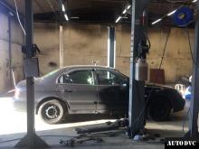 Installing a set of spacers to increase the ground clearance Hyundai Sonata IV (EF) Lift Kits (leveling kits and coil spring spacer\strut spacer)