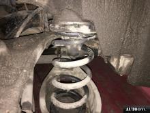 Installing a set of spacers to increase the ground clearance Infiniti FX II Lift Kits (leveling kits and coil spring spacer\strut spacer)