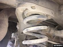 Installing a set of spacers to increase the ground clearance Infiniti QX56 Lift Kits (leveling kits and coil spring spacer\strut spacer)