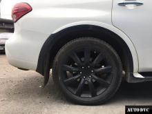 Installing a set of spacers to increase the ground clearance Infiniti QX56 Lift Kits (leveling kits and coil spring spacer\strut spacer)