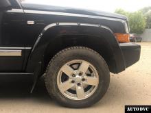 Installing a set of spacers to increase the ground clearance Jeep Commander Lift Kits (leveling kits and coil spring spacer\strut spacer)