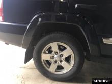 Installing a set of spacers to increase the ground clearance Jeep Commander Lift Kits (leveling kits and coil spring spacer\strut spacer)