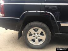 Installing a set of spacers to increase the ground clearance Jeep Commander Lift Kits (leveling kits and coil spring spacer\strut spacer)