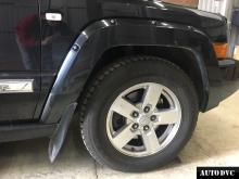 Installing a set of spacers to increase the ground clearance Jeep Commander Lift Kits (leveling kits and coil spring spacer\strut spacer)