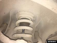 Installing a set of spacers to increase the ground clearance Jeep Commander Lift Kits (leveling kits and coil spring spacer\strut spacer)