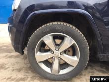 Installing a set of spacers to increase the ground clearance Jeep Grand Cherokee Lift Kits (leveling kits and coil spring spacer\strut spacer)