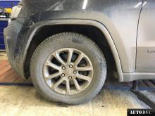 Installing a set of spacers to increase the ground clearance Jeep Grand Cherokee IV Lift Kits (leveling kits and coil spring spacer\strut spacer)