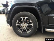 Installing a set of spacers to increase the ground clearance Jeep Grand Cherokee Lift Kits (leveling kits and coil spring spacer\strut spacer)