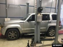 Installing a set of spacers to increase the ground clearance Jeep Cherokee IV (KK) Lift Kits (leveling kits and coil spring spacer\strut spacer)