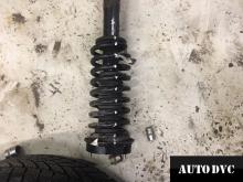 Installing a set of spacers to increase the ground clearance Jeep Grand Cherokee Lift Kits (leveling kits and coil spring spacer\strut spacer)