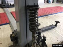 Installing a set of spacers to increase the ground clearance Jeep Grand Cherokee Lift Kits (leveling kits and coil spring spacer\strut spacer)