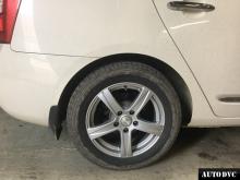 Installing a set of spacers to increase the ground clearance Kia Carens Lift Kits (leveling kits and coil spring spacer\strut spacer)