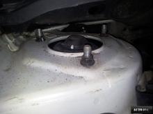 Installing a set of spacers to increase the ground clearance Kia Carens III Lift Kits (leveling kits and coil spring spacer\strut spacer)