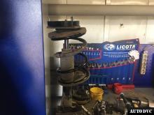 Installing a set of spacers to increase the ground clearance Kia Carens Lift Kits (leveling kits and coil spring spacer\strut spacer)