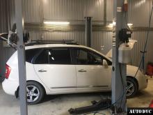 Installing a set of spacers to increase the ground clearance Kia Carens Lift Kits (leveling kits and coil spring spacer\strut spacer)